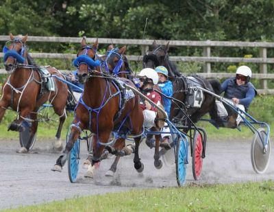 Tom Wood on the rail and with the lead is being challenged by Derrybeg and eventual winner of the Final