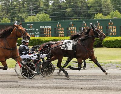 Pound Sterling and driver Bob Hechkoff holding on at Freehold Raceway