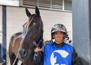 Cain cracks milestone on home soil