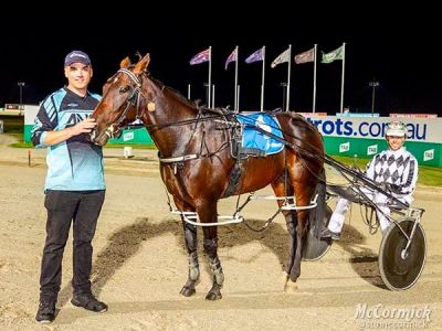 Classy mare Tangoingwithsierra, part-owner Craig Hoban and driver Greg Sugars at Melton