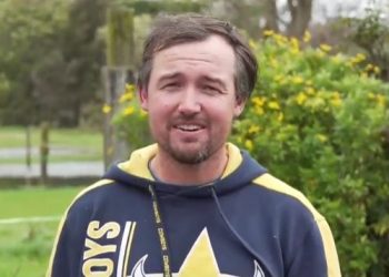 Harness racing trainer rescued from flooding