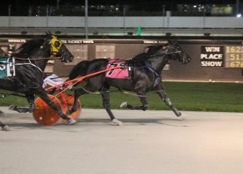Feature winner lowers mark by full second