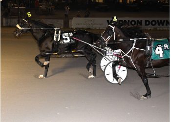 Natameri charges home late to win