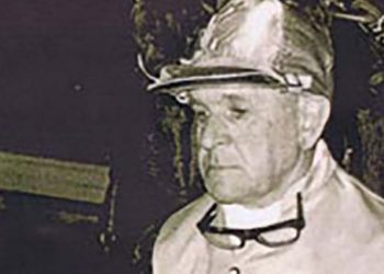 Who is Maurice Holmes?