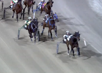 Aussie Lover wins four-wide for $200k