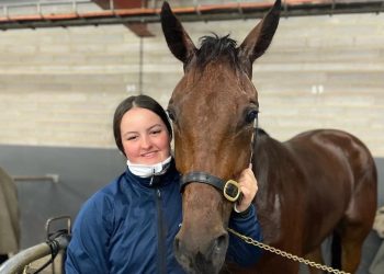 Young gun taking her chances in the sulky