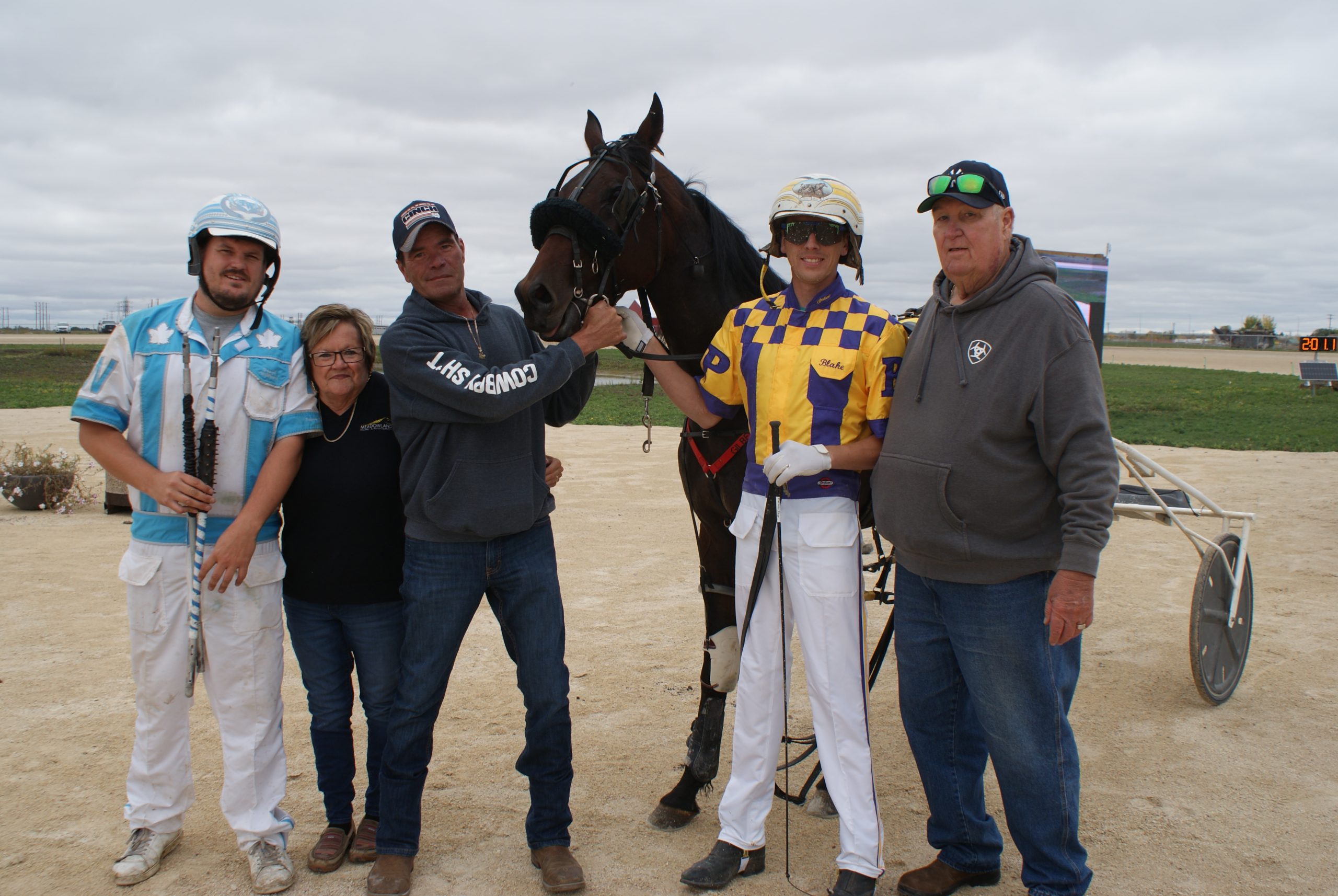 Handsome Dan and the winning connections after the Manitoba Great Western win. (Jody Oakes Photo)