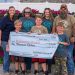 Redemption Ranch receives USHDC donation at Oak Grove