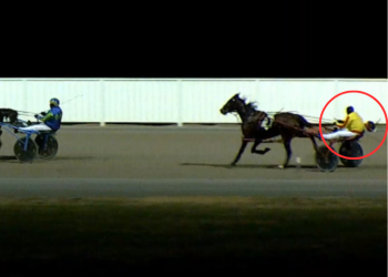 Driver loses helmet before running second