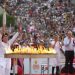 Women drivers help light Olympic torch in France