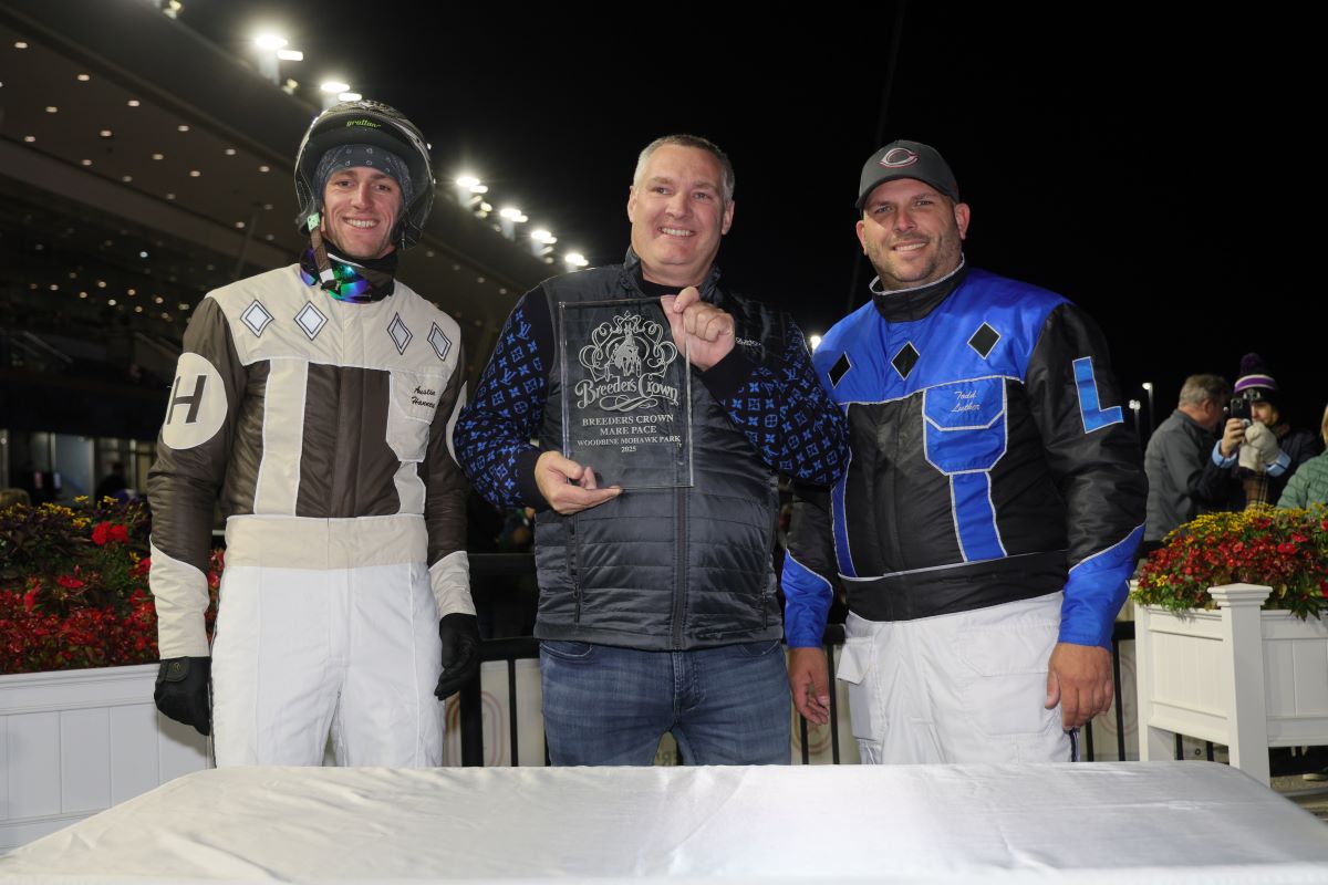 Austin Hanners, Greg Luther and Todd Luther with Breeders Crown trophy